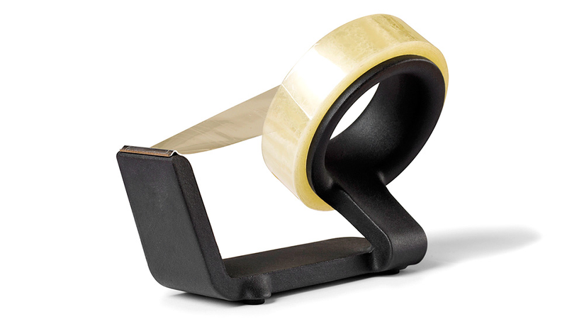 Illustration for article titled A Two-Pound Cast Iron Tape Dispenser Guarantees One-Handed Operation